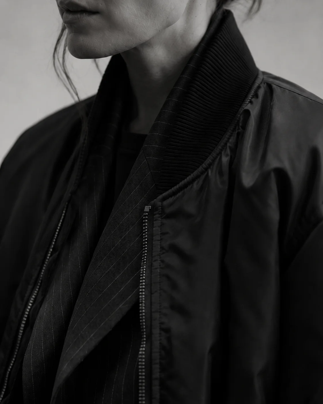 Editorial — a tailored collar and bomber, in monochrome